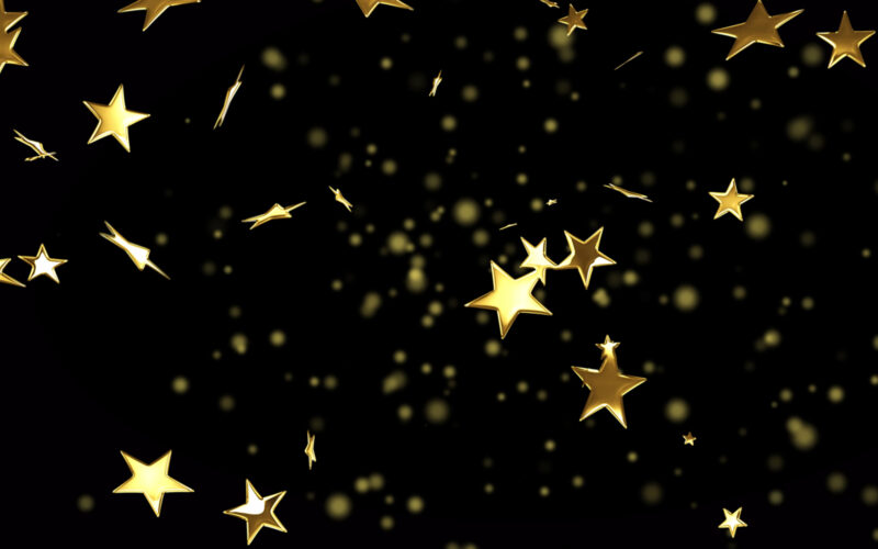 A lot of gold stars on black background